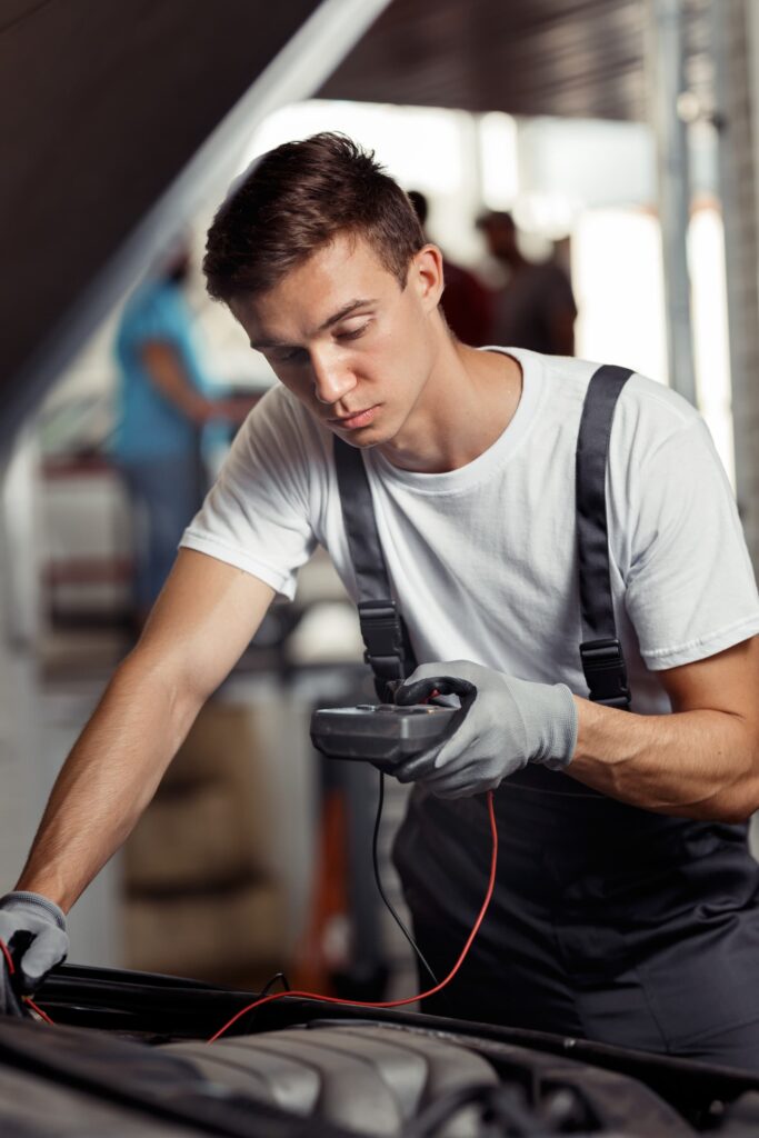 An attractive car mechanic is checking the results 2024 09 20 17 07 42 utc young worker